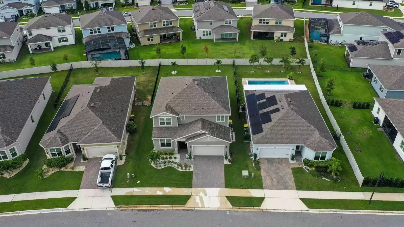 Large paver driveway and oversized homesite