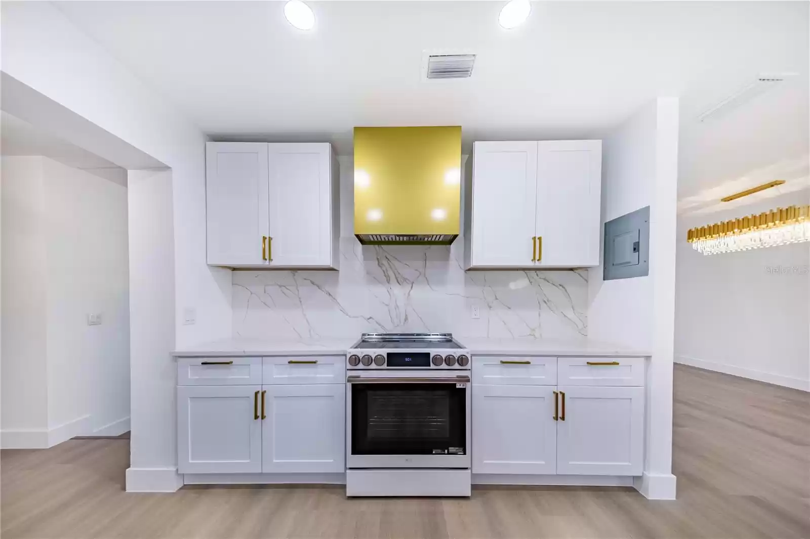 Kitchen also features new Quartz Countertops and matching slab backsplashes