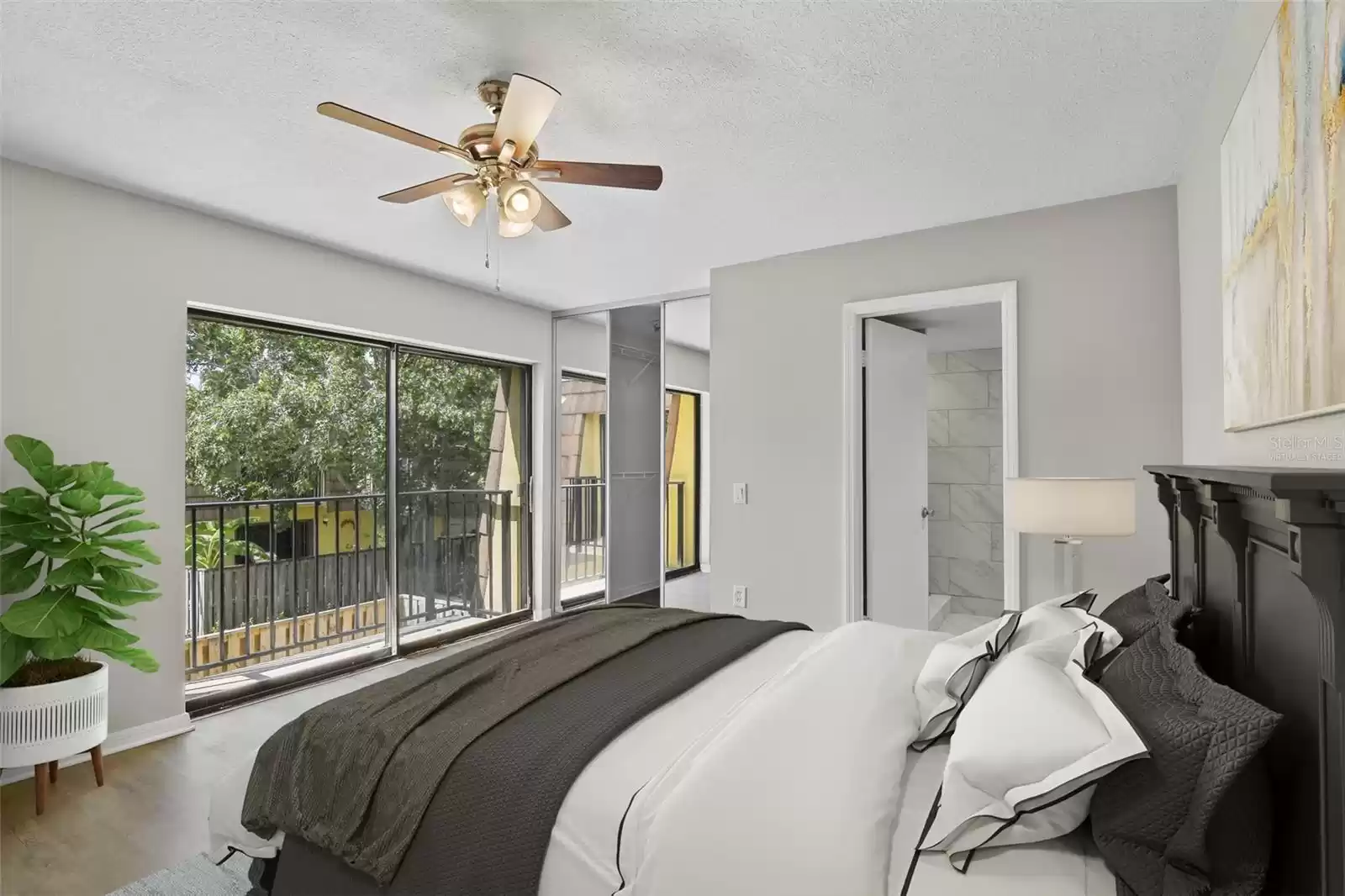 Two bedrooms await upstairs, where the LUXURY VINYL PLANK WOOD FLOORS continue in both the PRIMARY SUITE and second bedroom. Virtually Staged.