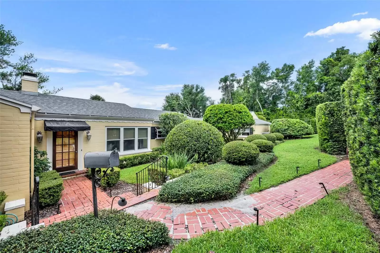 Front yard with mature landscaping