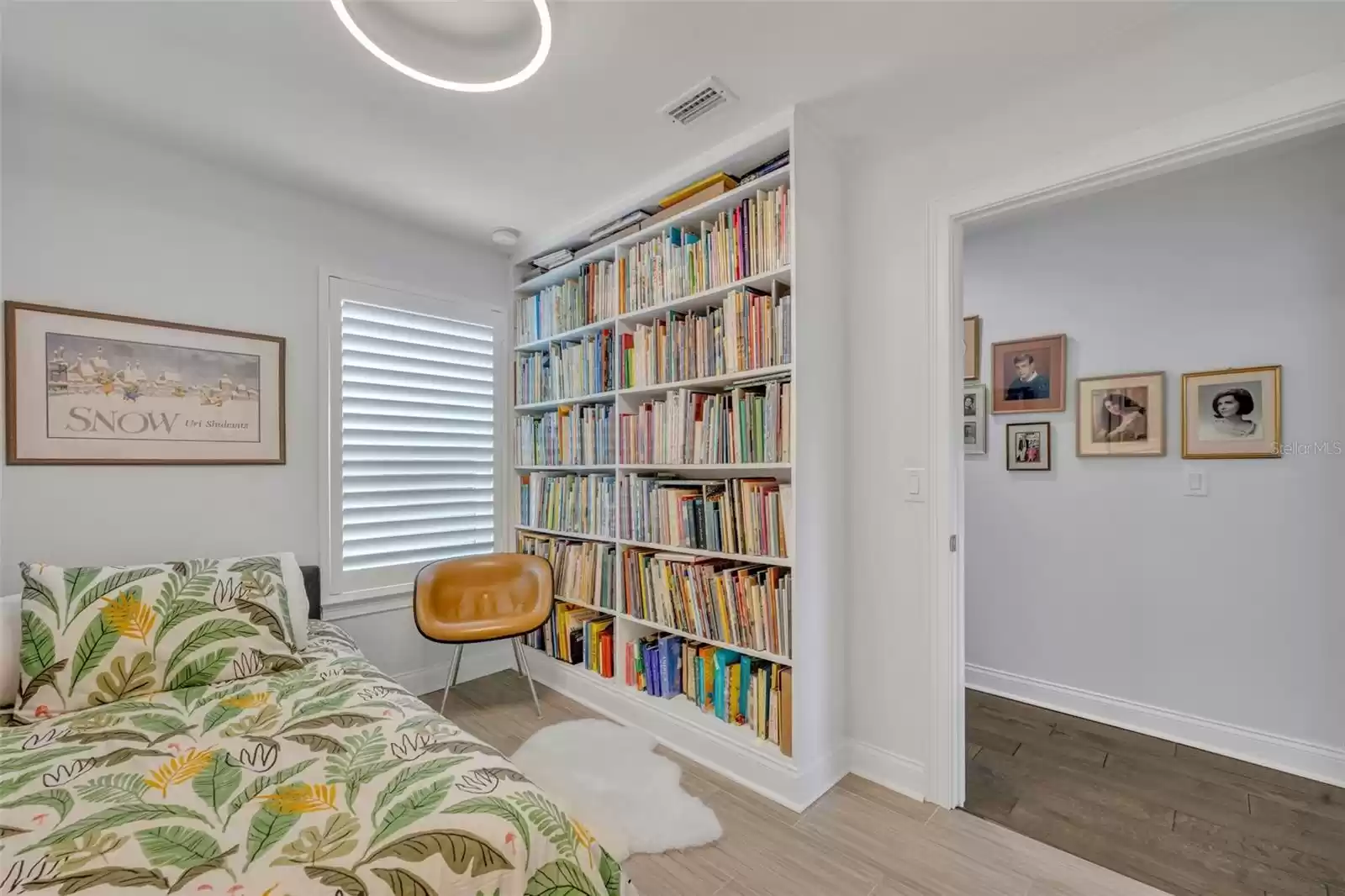 Guest bed with built-in wall of storage