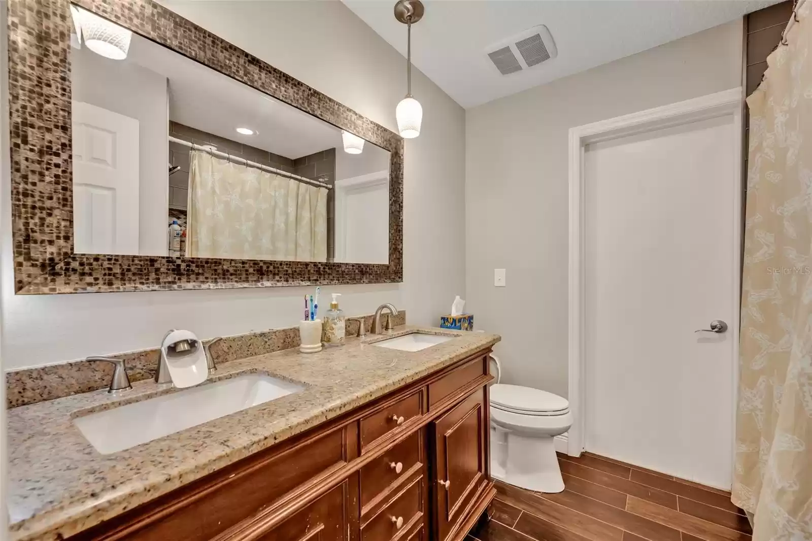 Bathroom next to Bedroom 4 with shower/tub combo