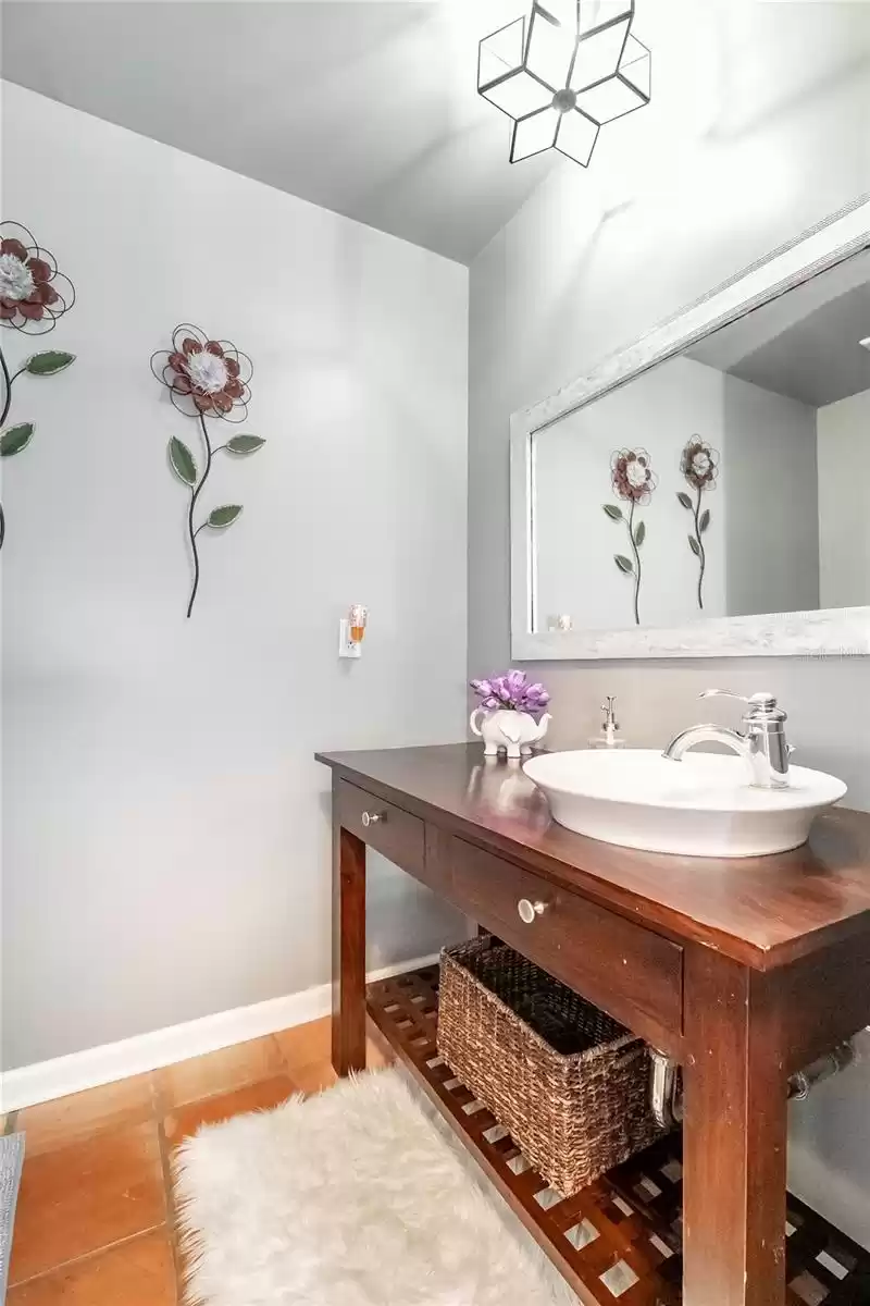 Half Bath for guests with original Mexican Tile