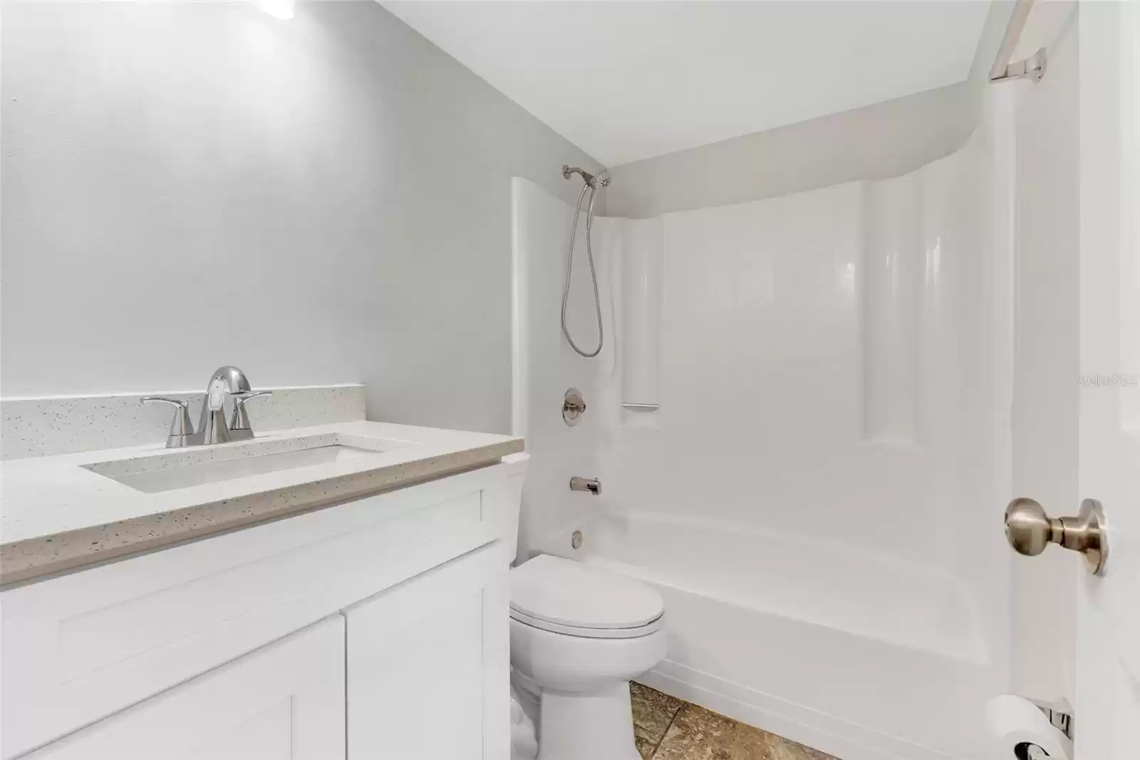 New white bath vanity, new sink and fixture.