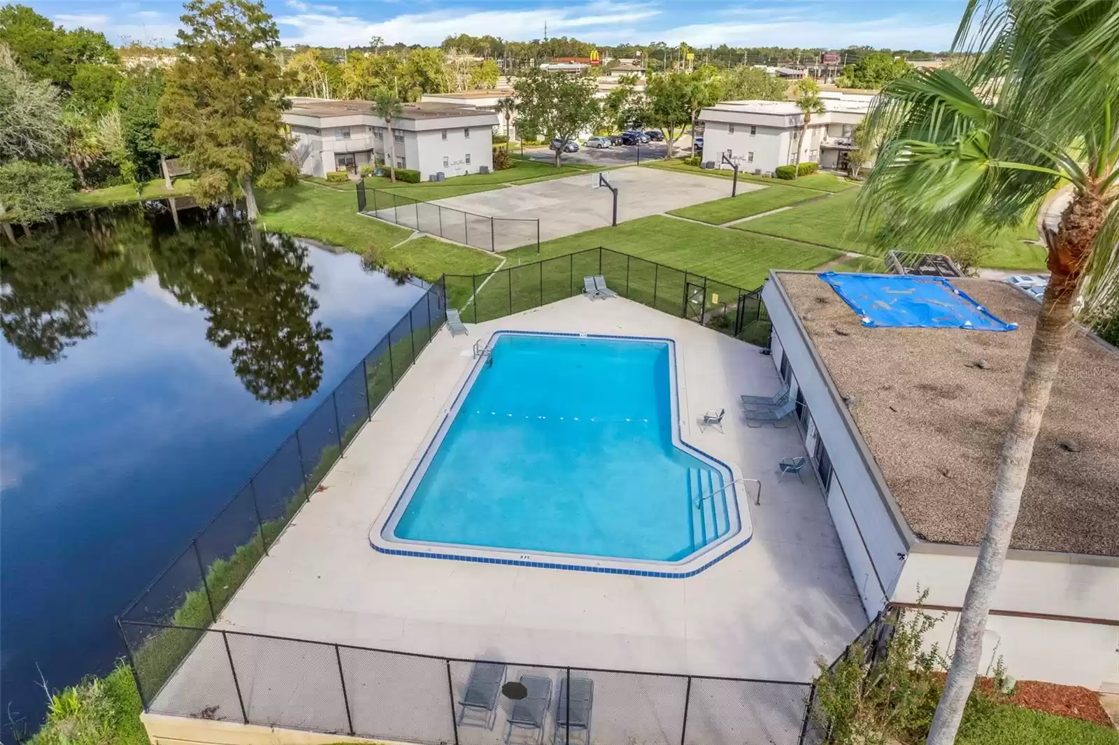 Community pool and basketball courts in Windtree.