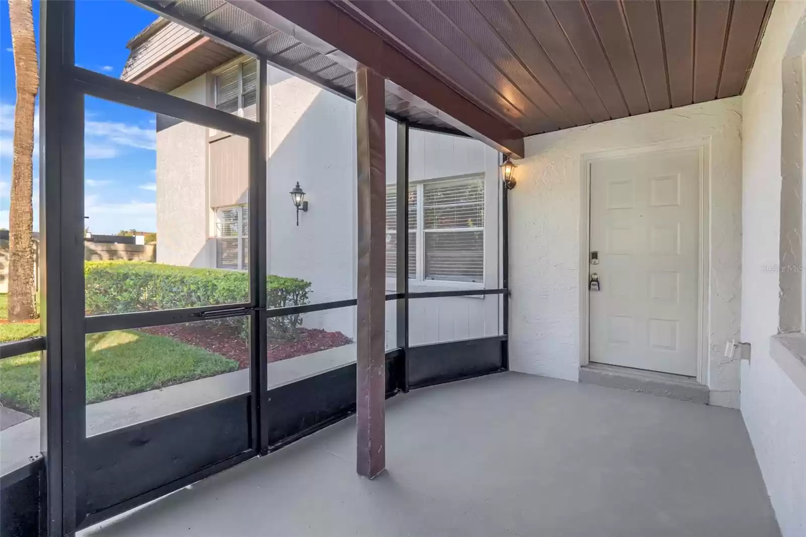 Newly screened patio with newly painted floor!