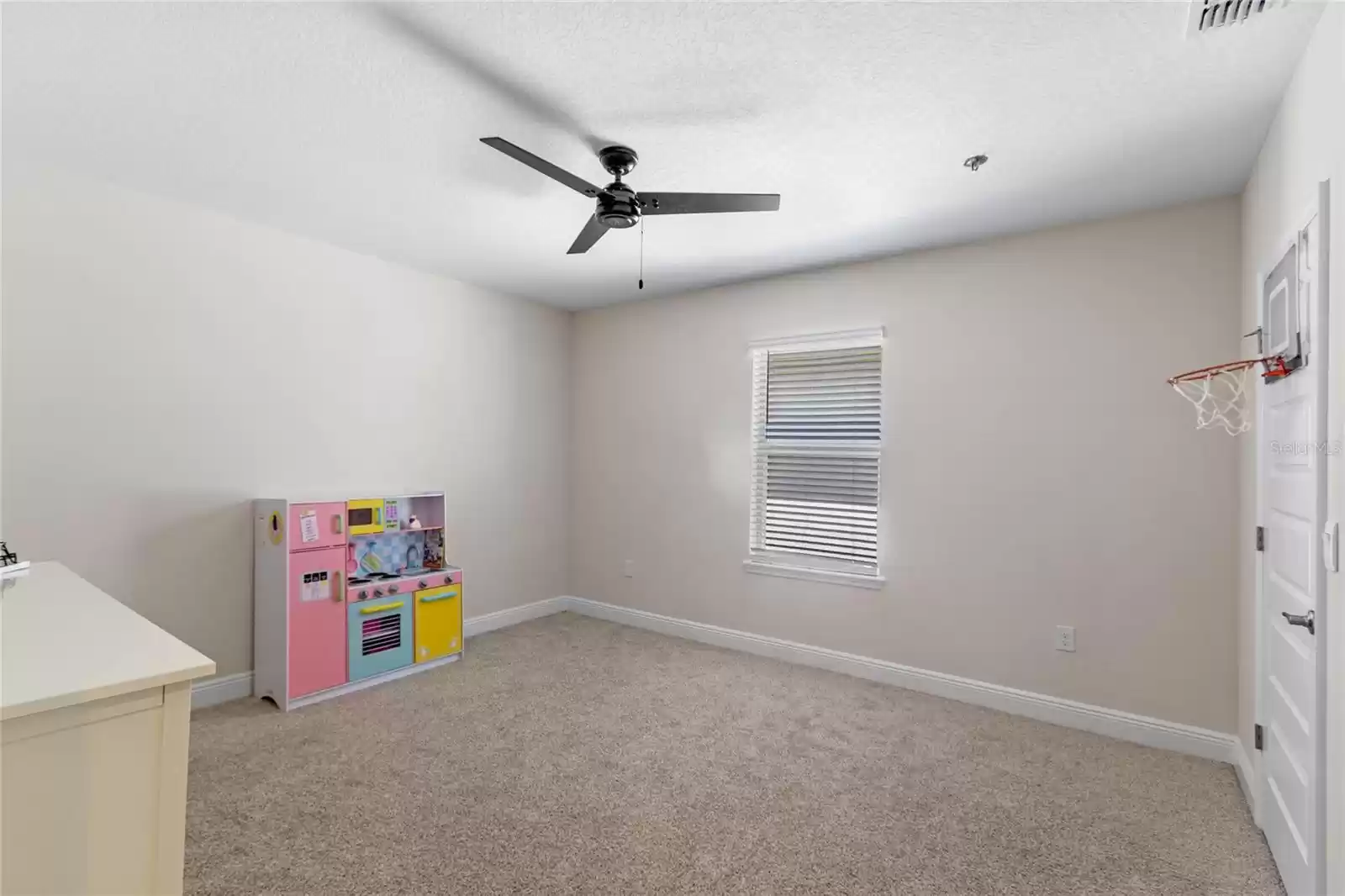 Secondary bedroom with large walk in closet.