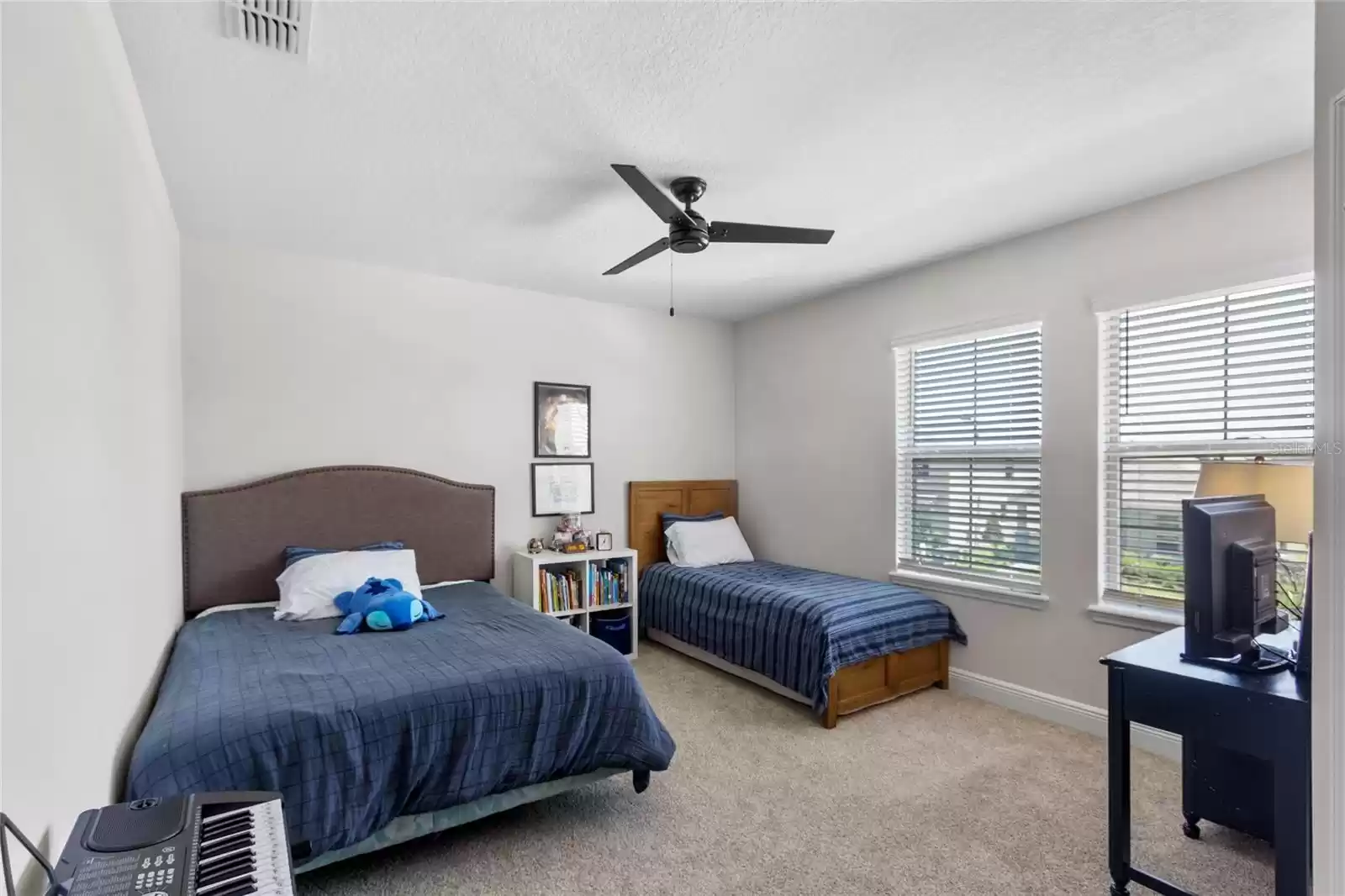 Secondary bedroom with large walk in closet.