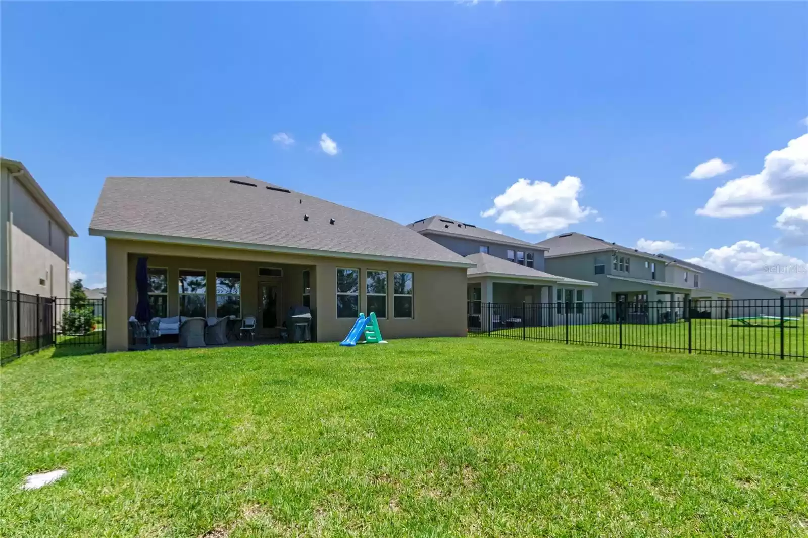 View to house from large back yard.