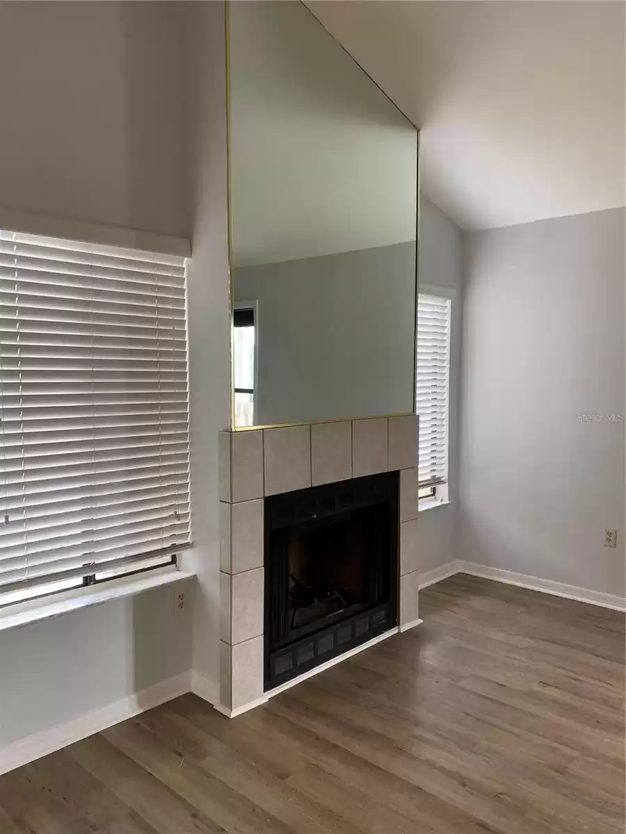 Living Room with Wood Burning Fireplace