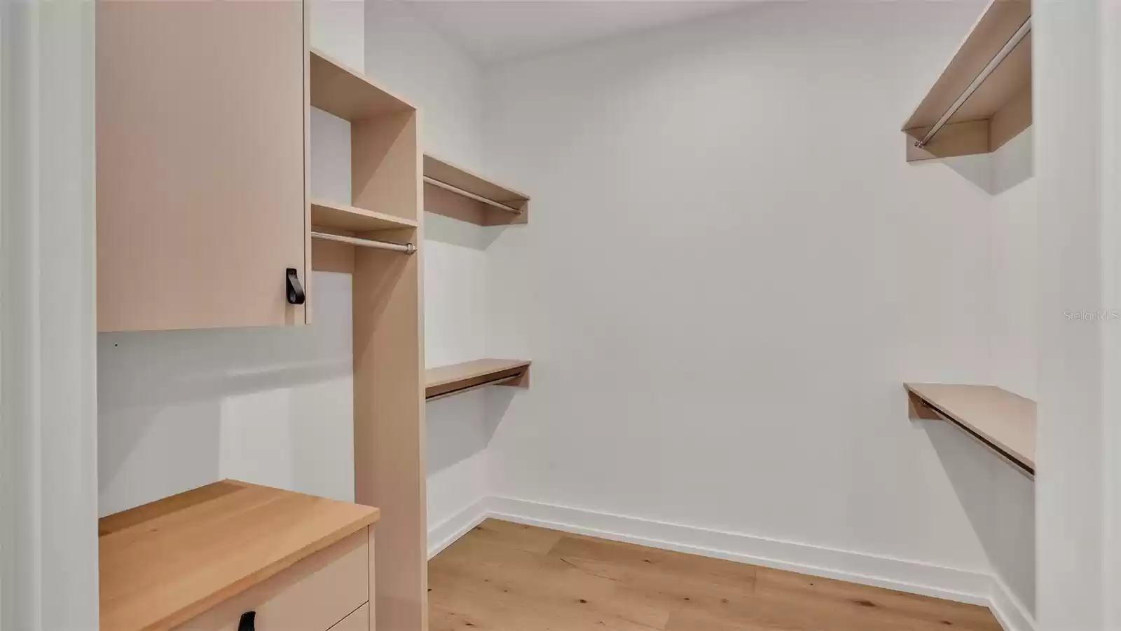 Primary Bedroom walk-in closet