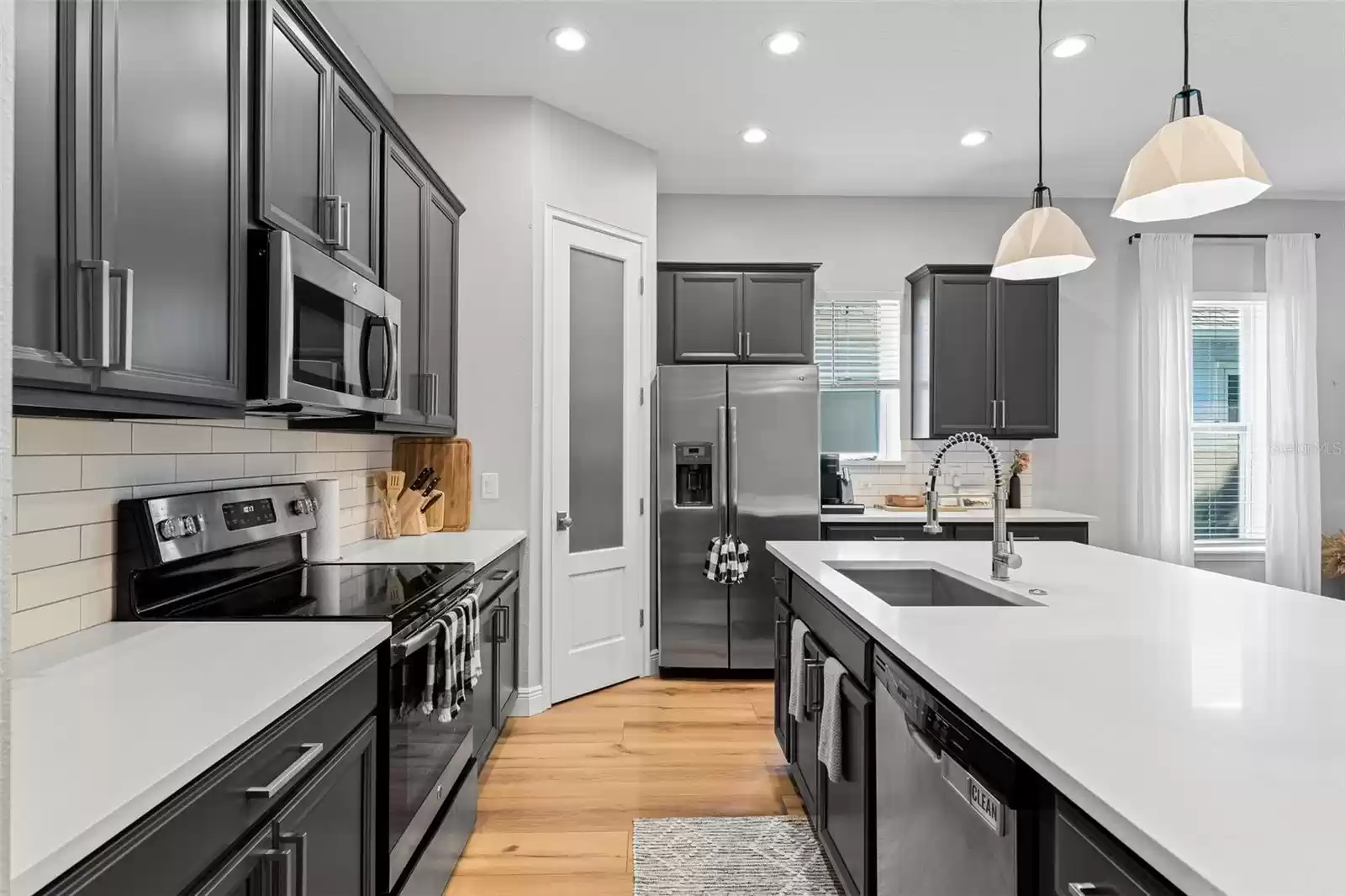 Kitchen with stainless steel appliances.