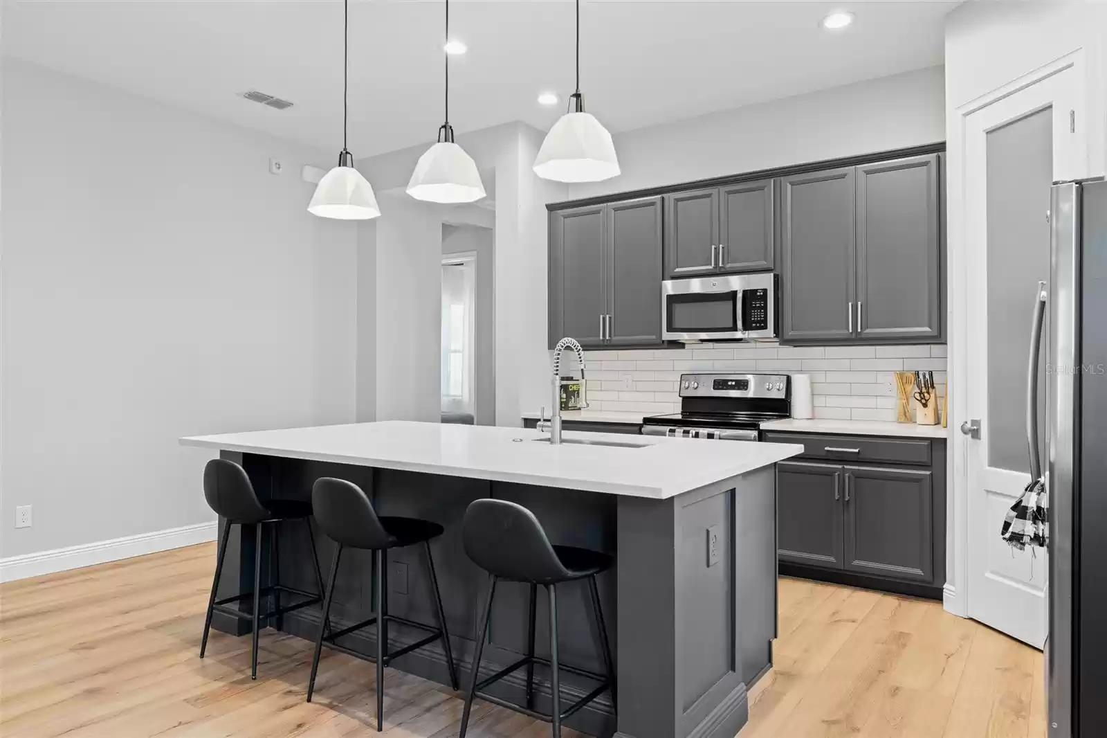 Kitchen with plenty of cabinet storage.