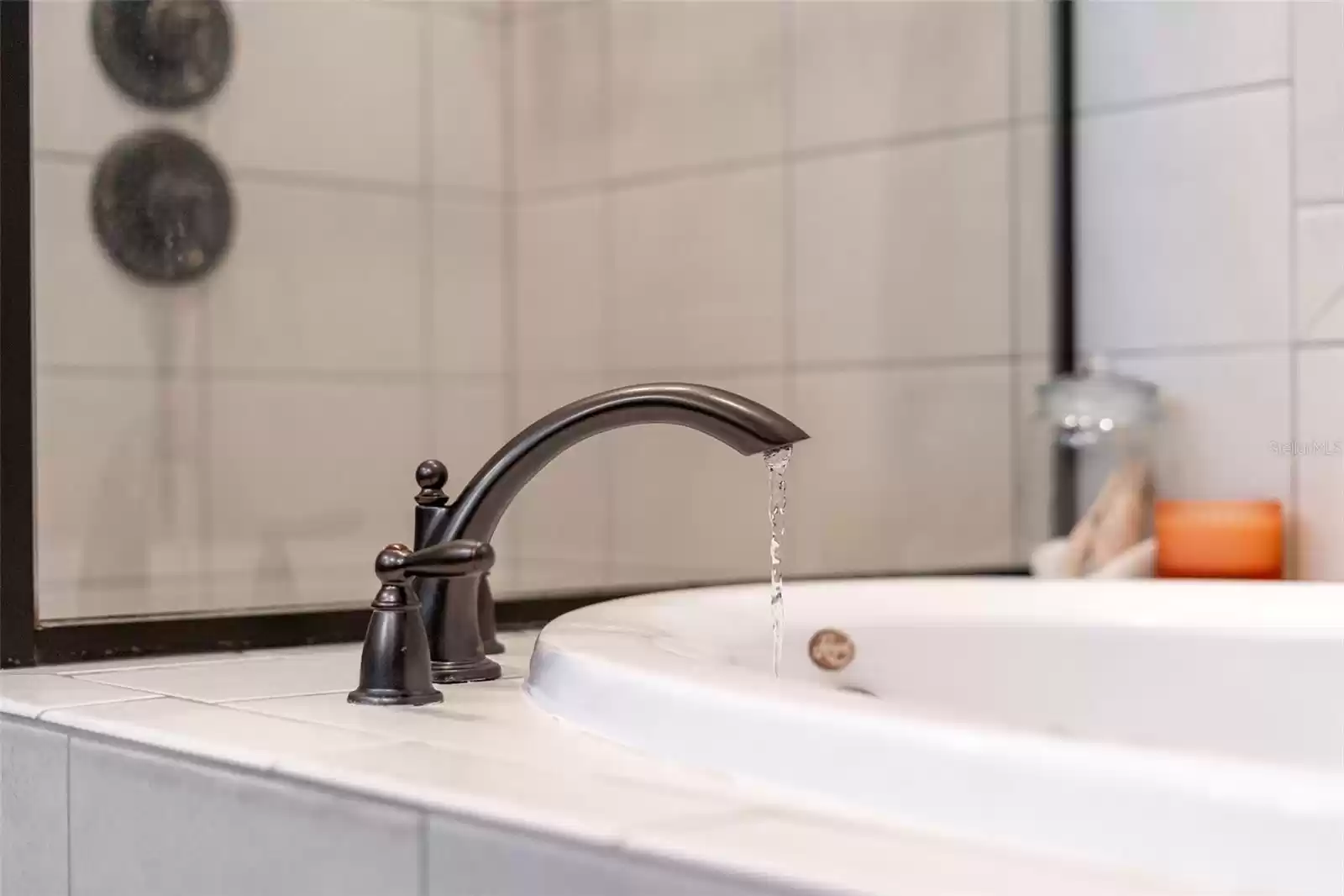 Primary bathroom with designer fixtures.