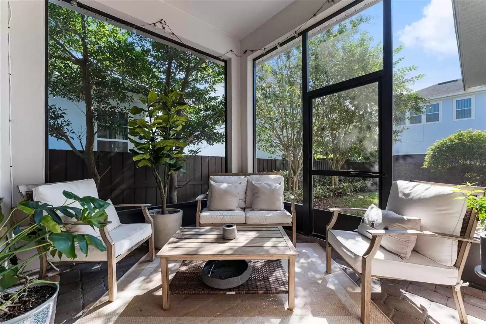 Rear screened-in porch off of family room.