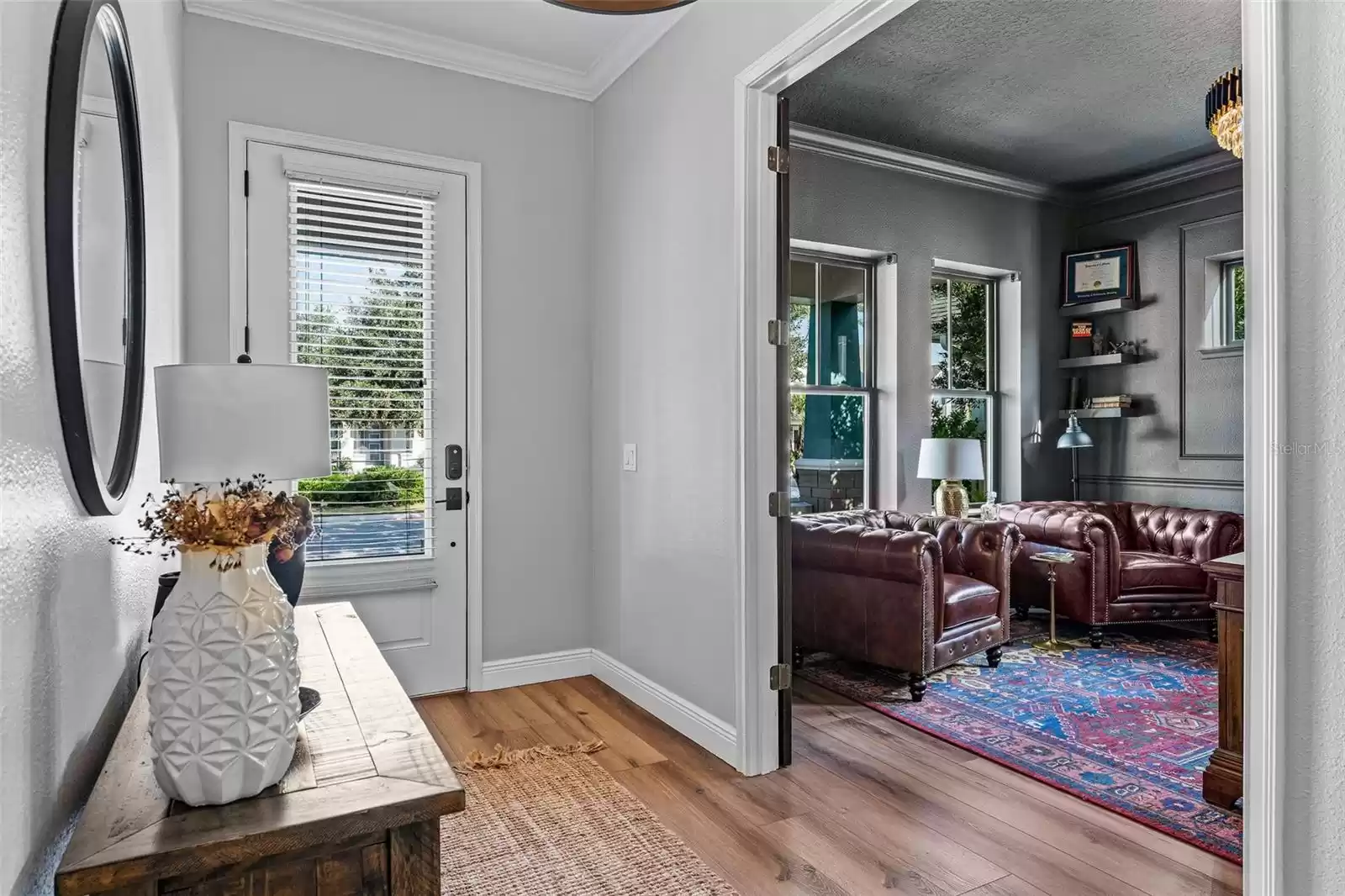 Entry way with French doors to office.