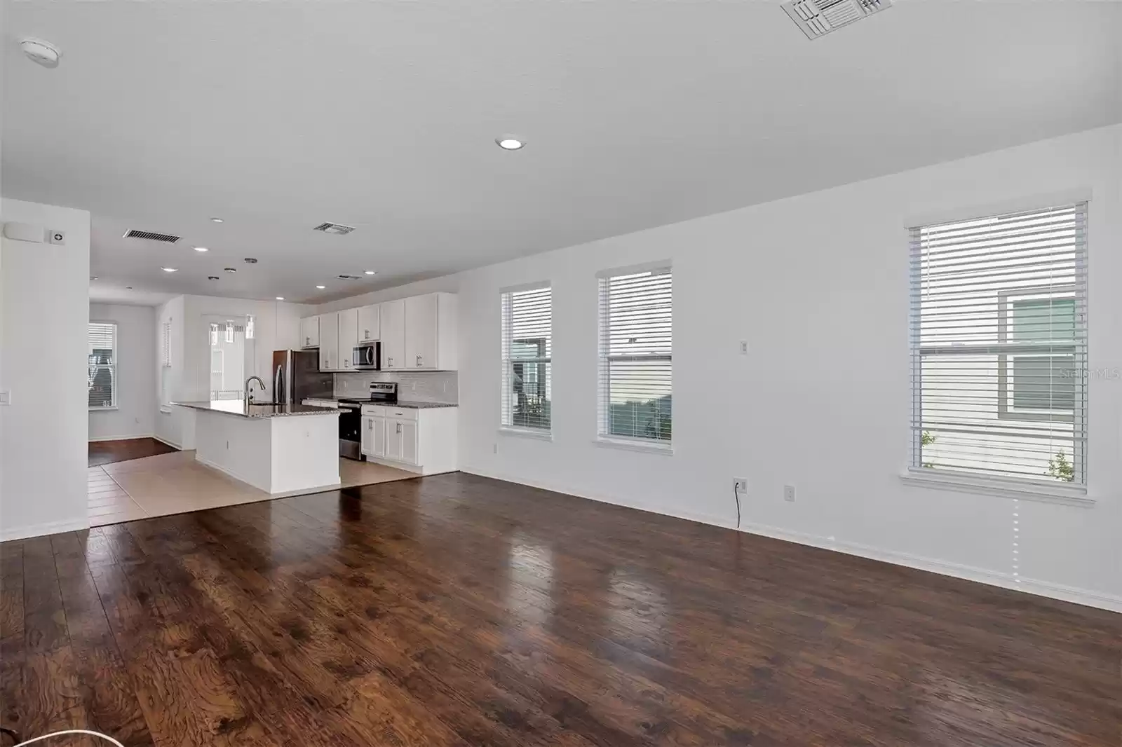 Living room looking into kitchen