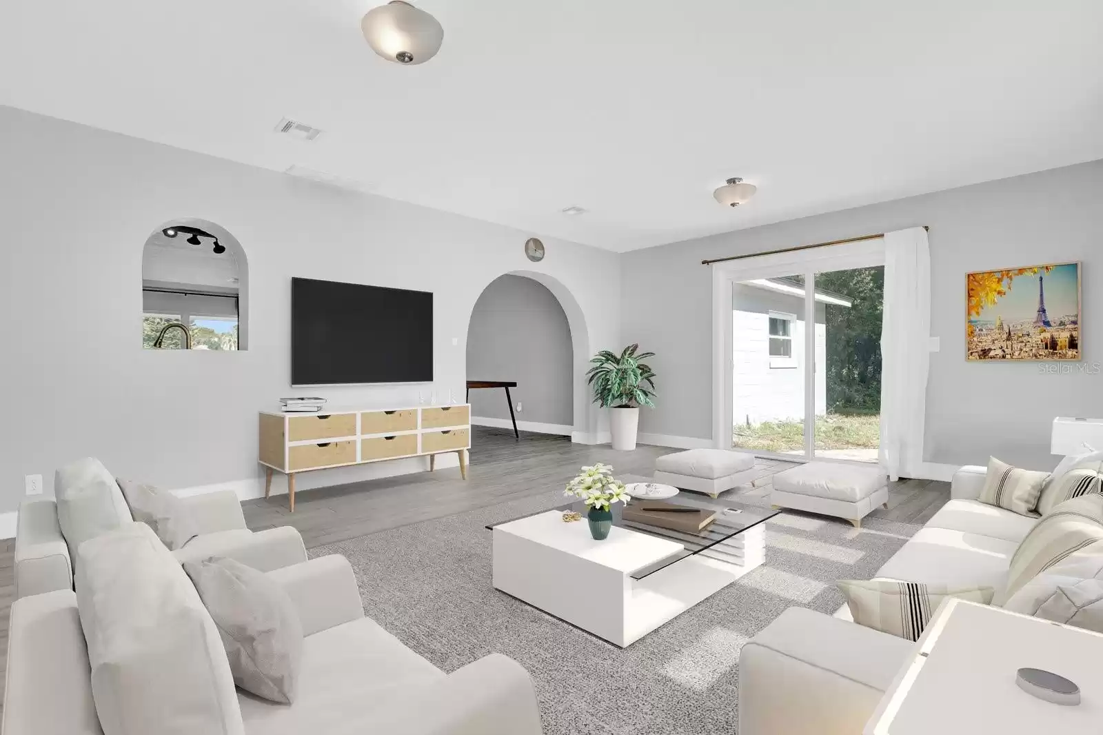 Family Room with views of lush green landscaping