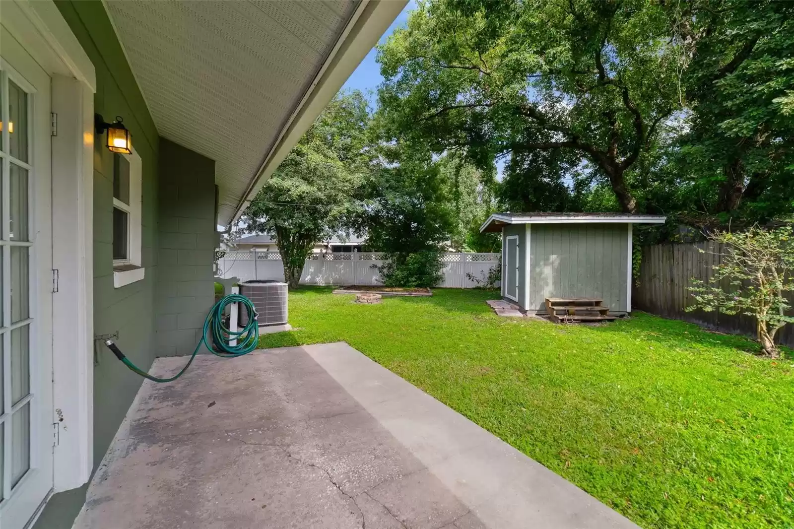 The beautiful mature trees that surround this home create a park-like setting and add privacy for you to enjoy the outdoor space.