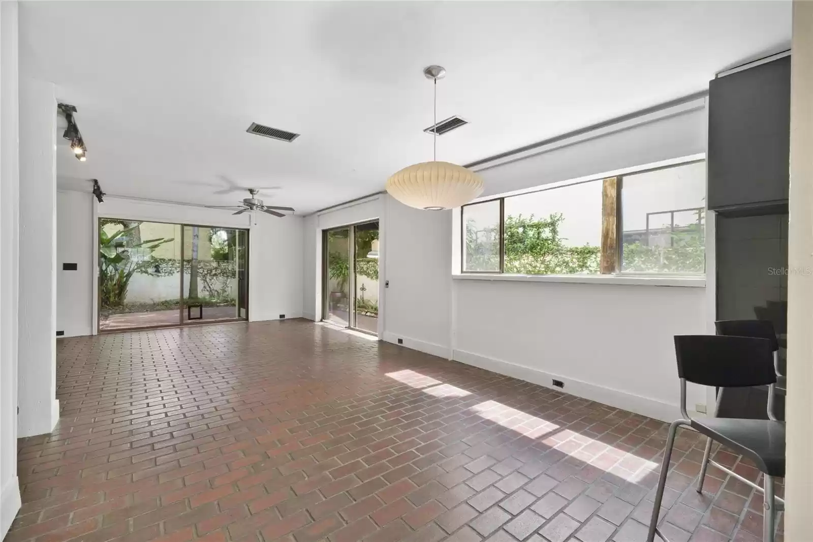 Open concept floor plan with large windows that allow for an abundance of natural light.