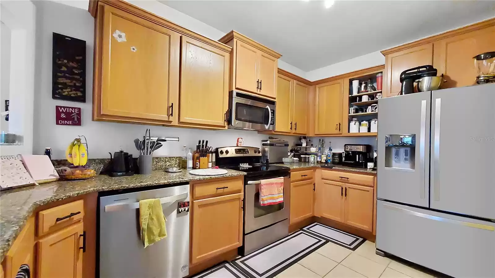 Kitchen with Stainless Steel appliances and solid stone countertops