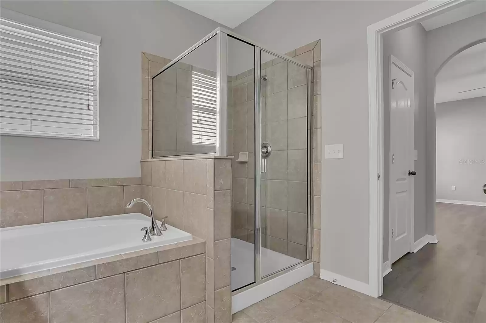 Primary bath with garden soaking tub and separate shower