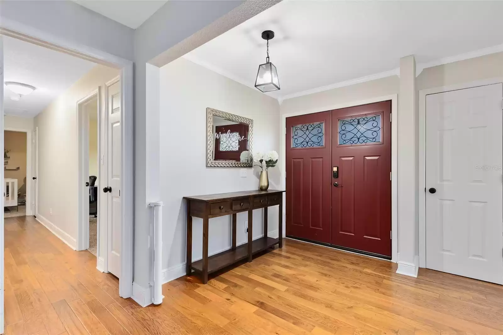 Double doors welcome you into this meticulously maintained home.