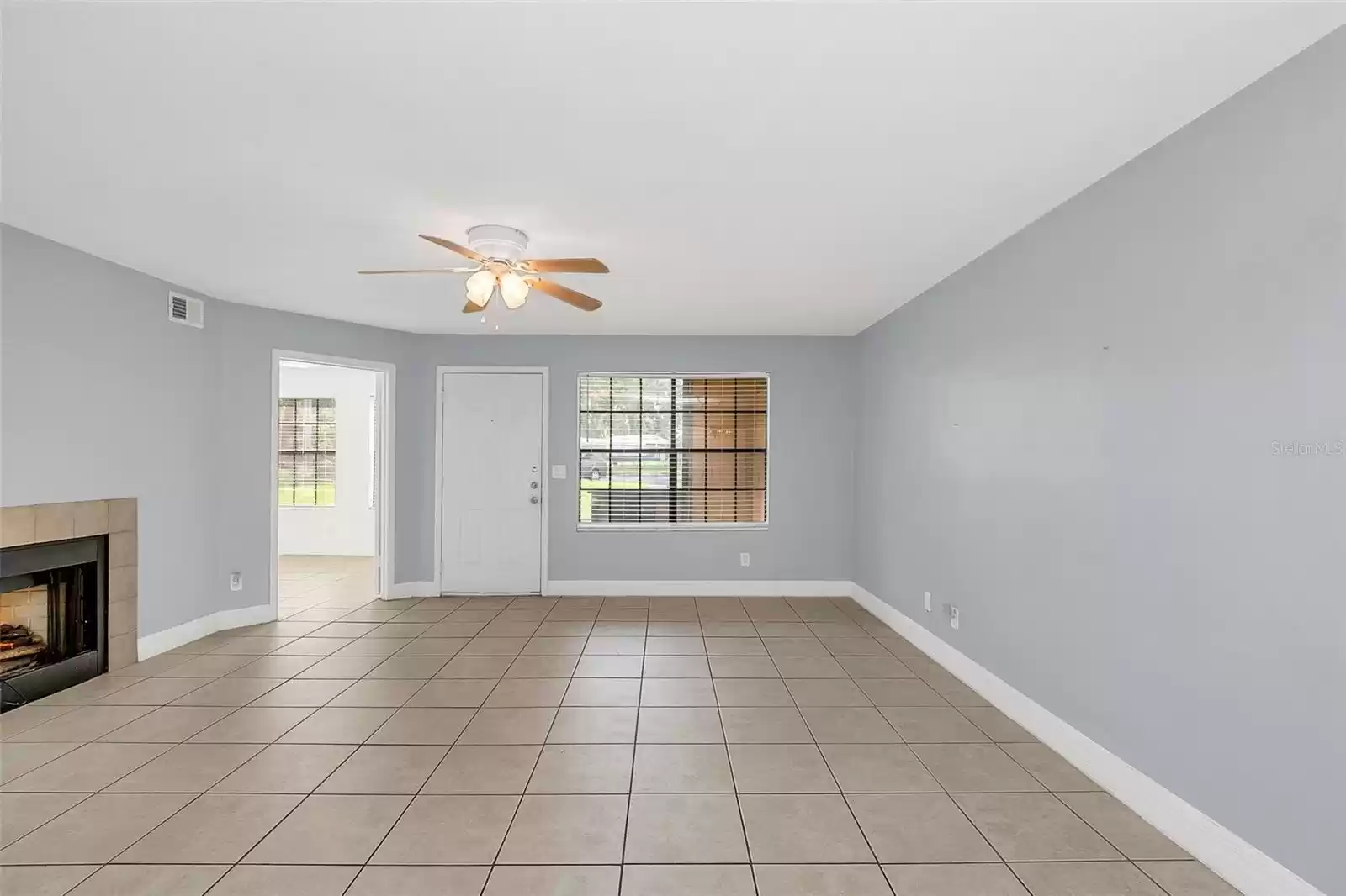 FULL LIVING ROOM TO FRONT DOOR