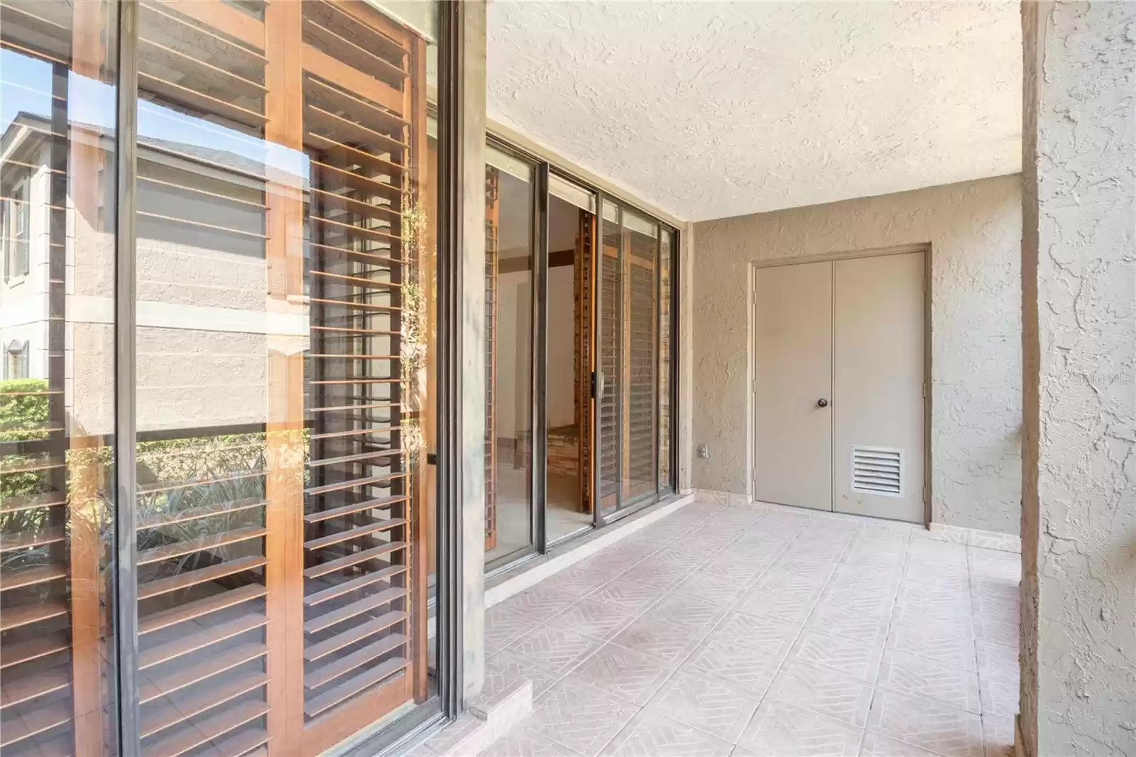 Rear screen patio with storage closet