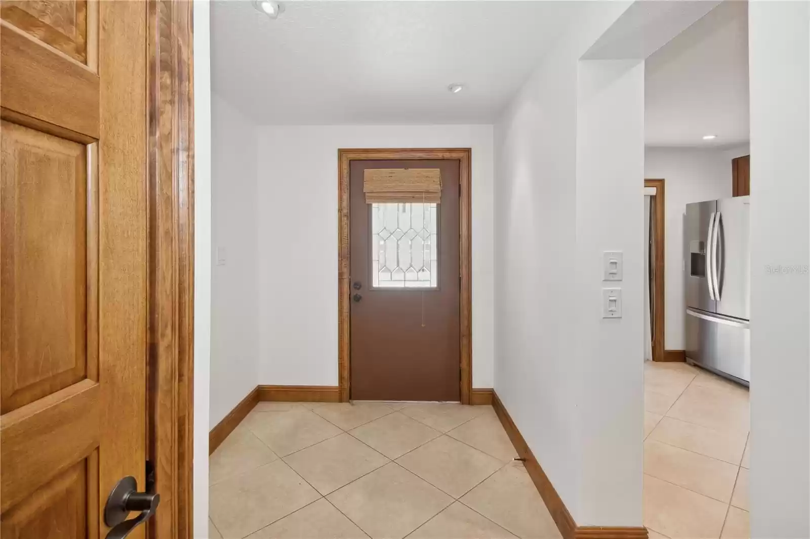 foyer with kitchen on left as you enter