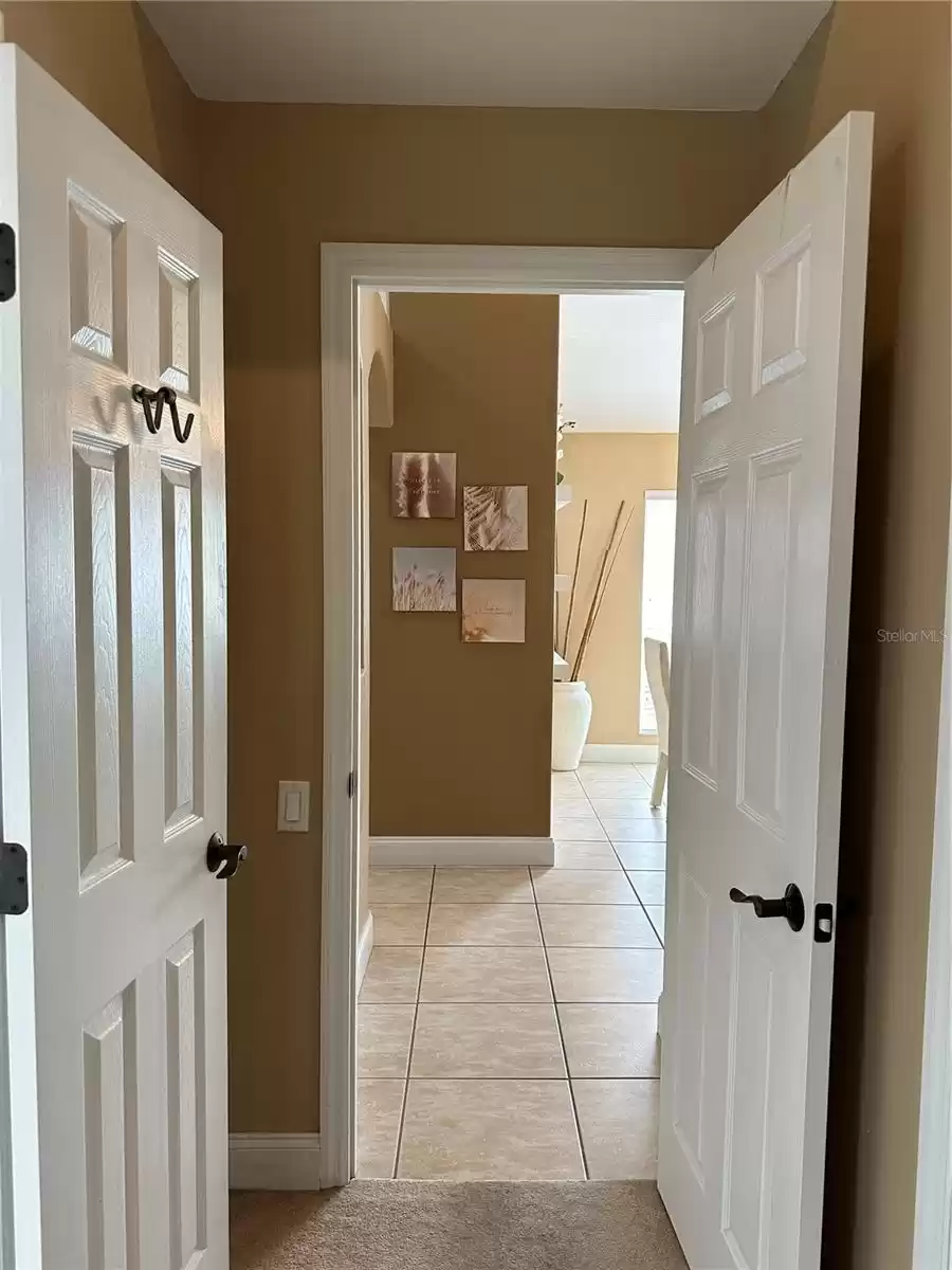 Master Bedroom Door leading to Kitchen and Dining/Living Areas