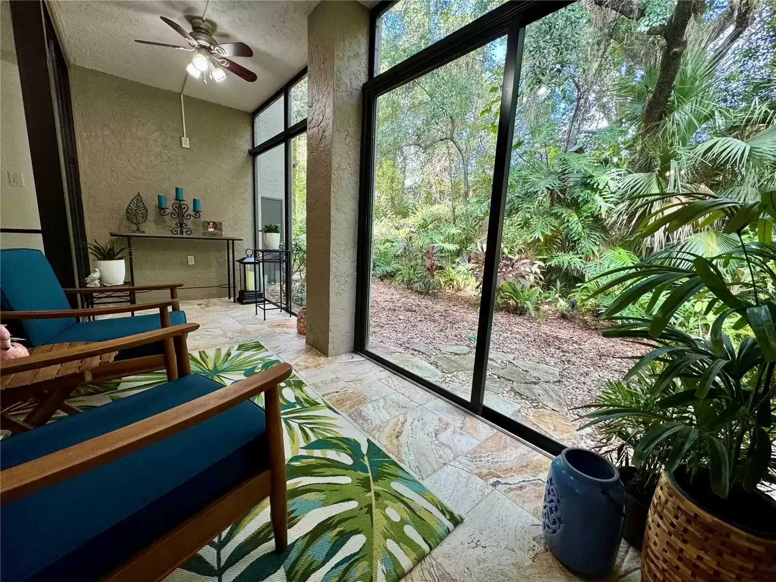 Back porch with sliding door access to the backyard