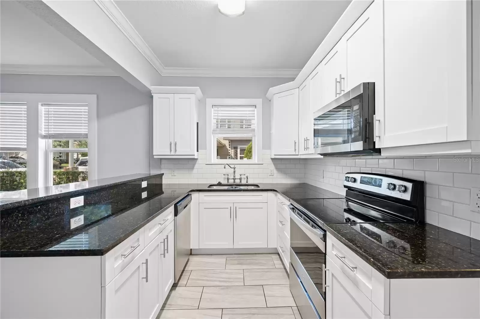 Kitchen with granite countertops and stainless steel appliances