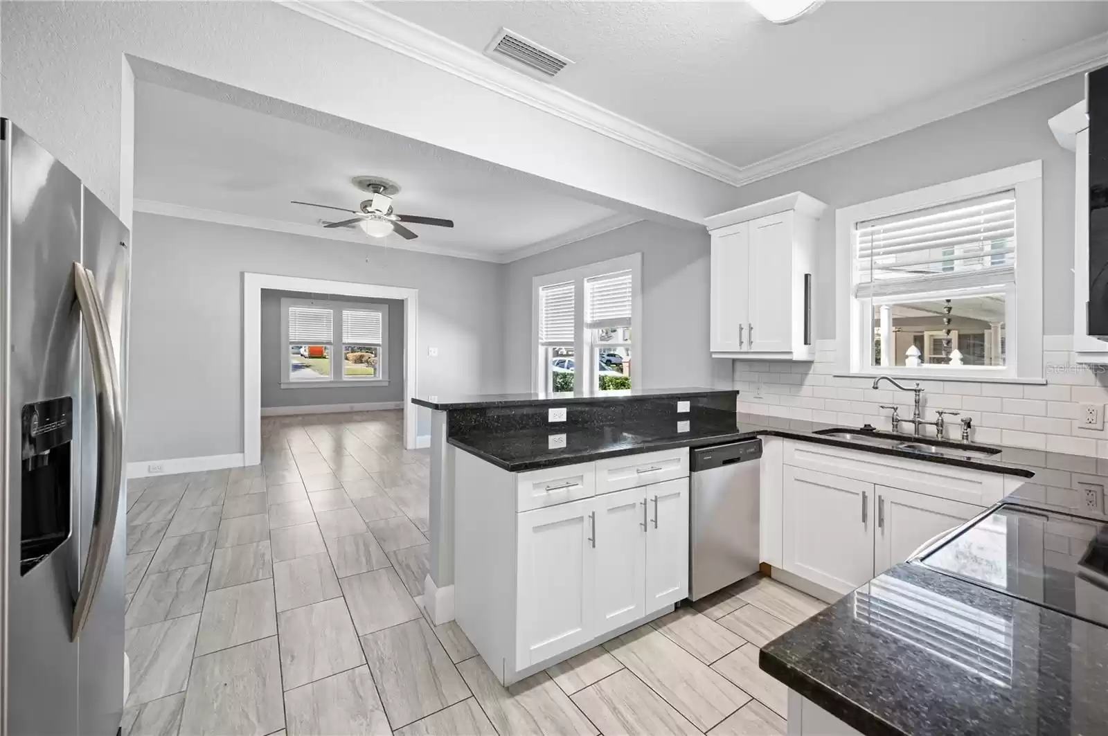 Kitchen with view of dining room and living room (open concept)