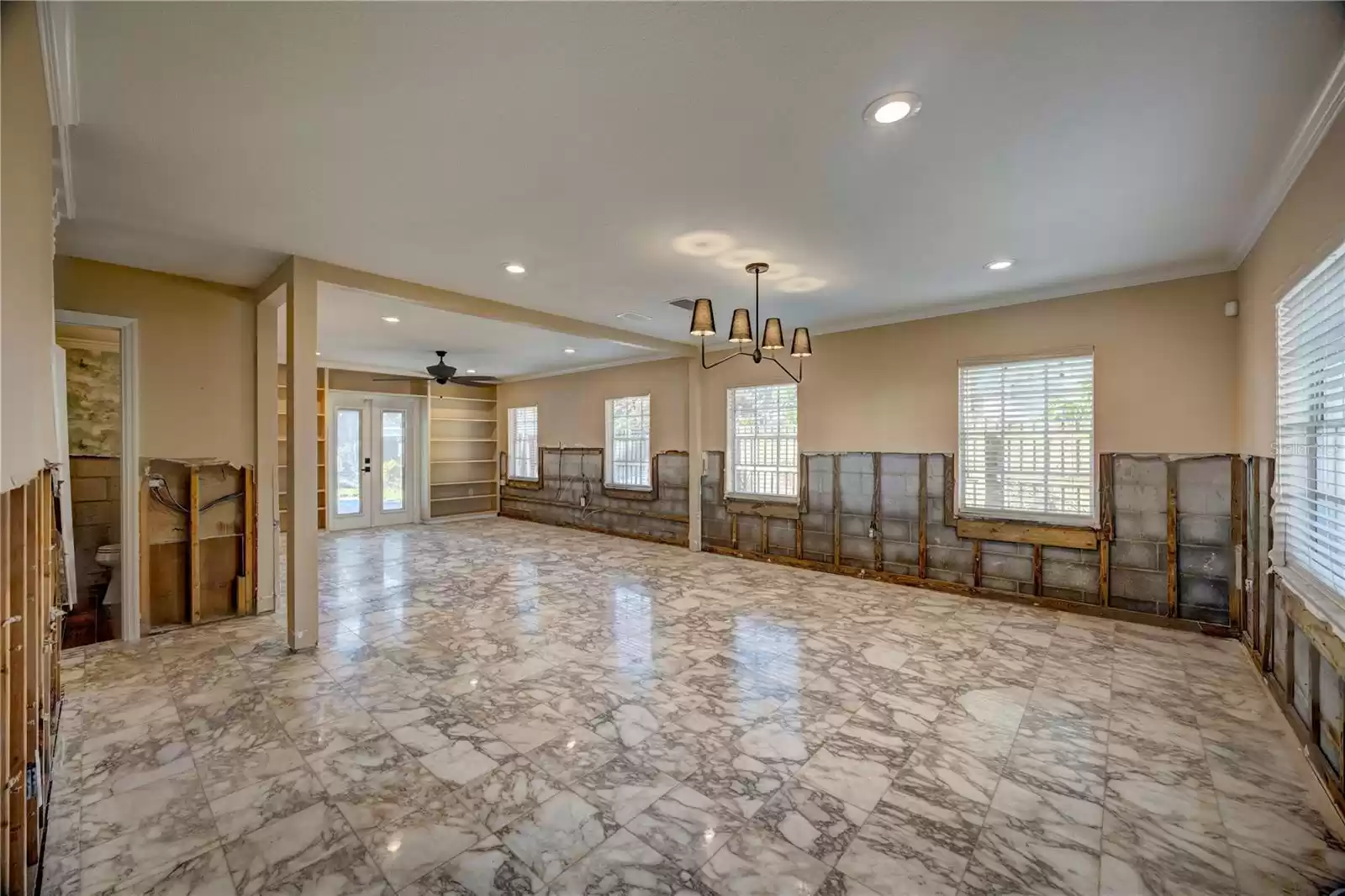 Open floor plan downstairs with the original Italian marble tile!