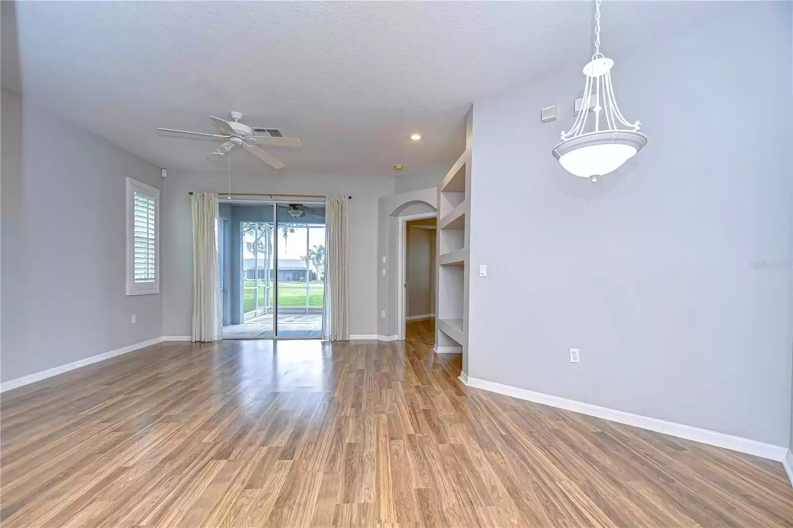 view from kitchen to living room and patio