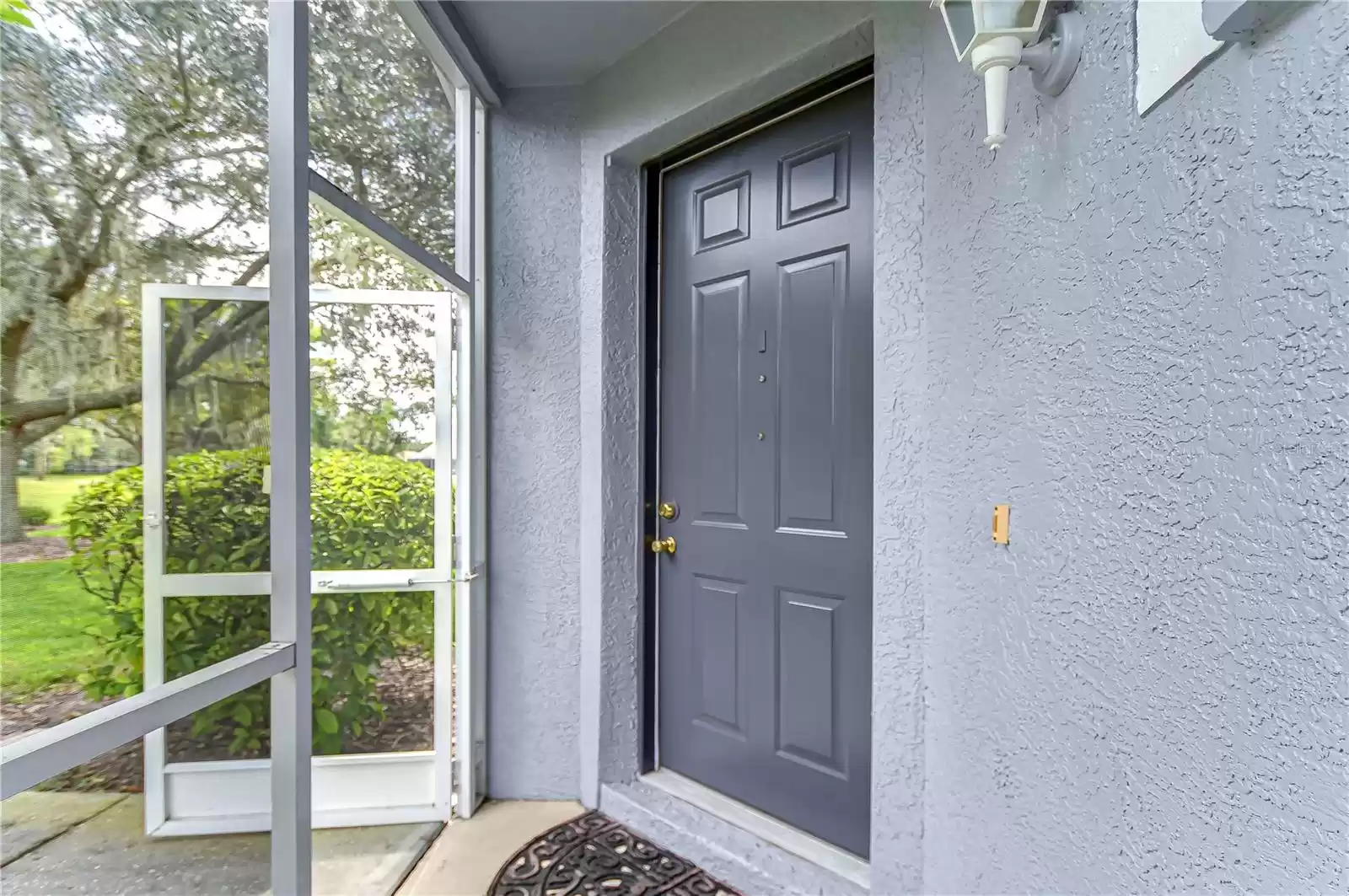 Front door entrance with screened patio