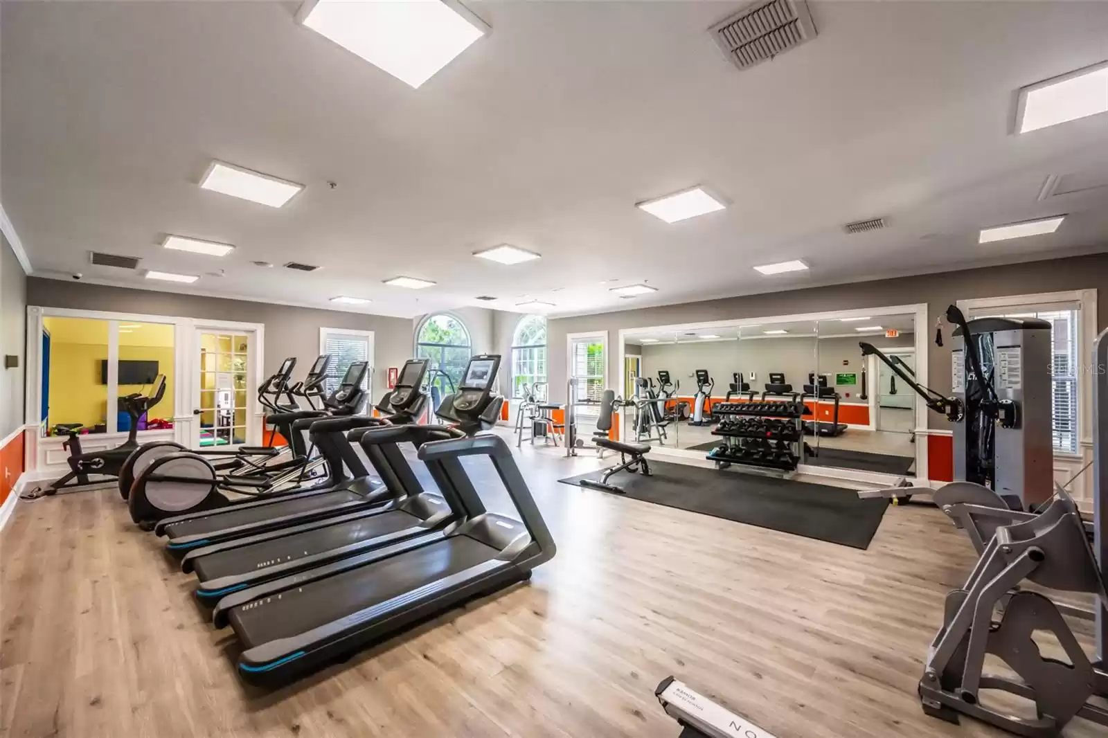 Fully equipped fitness center attached to playroom