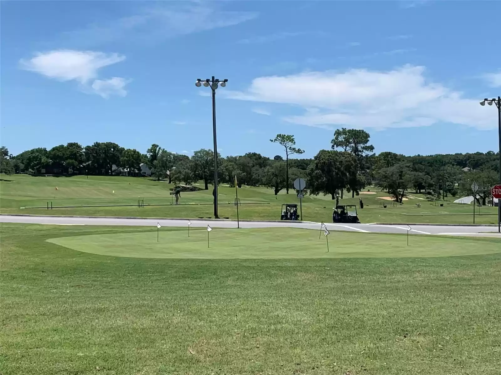 putting green at community entrance