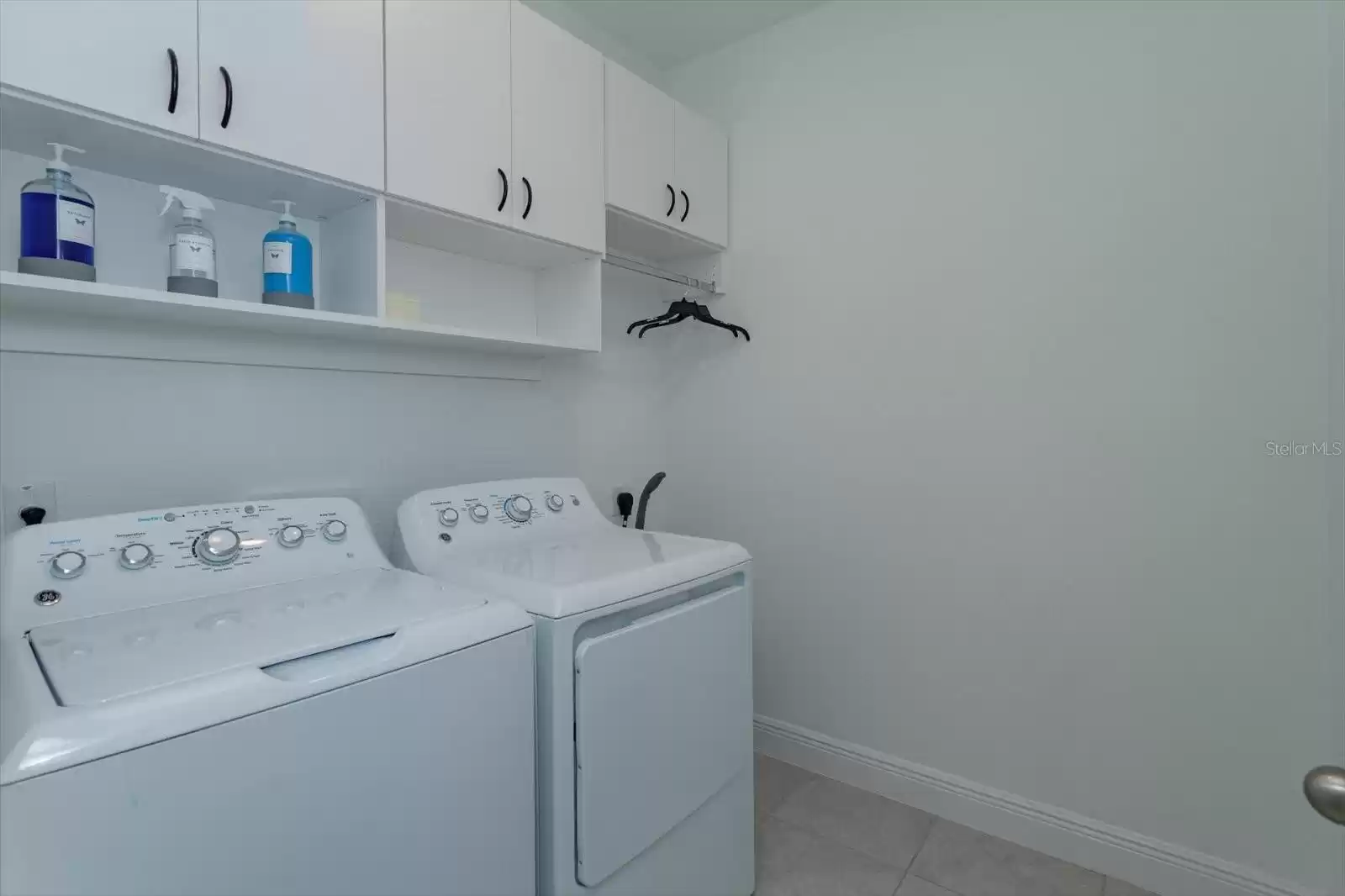 Laundry Room with Custom Cabinets