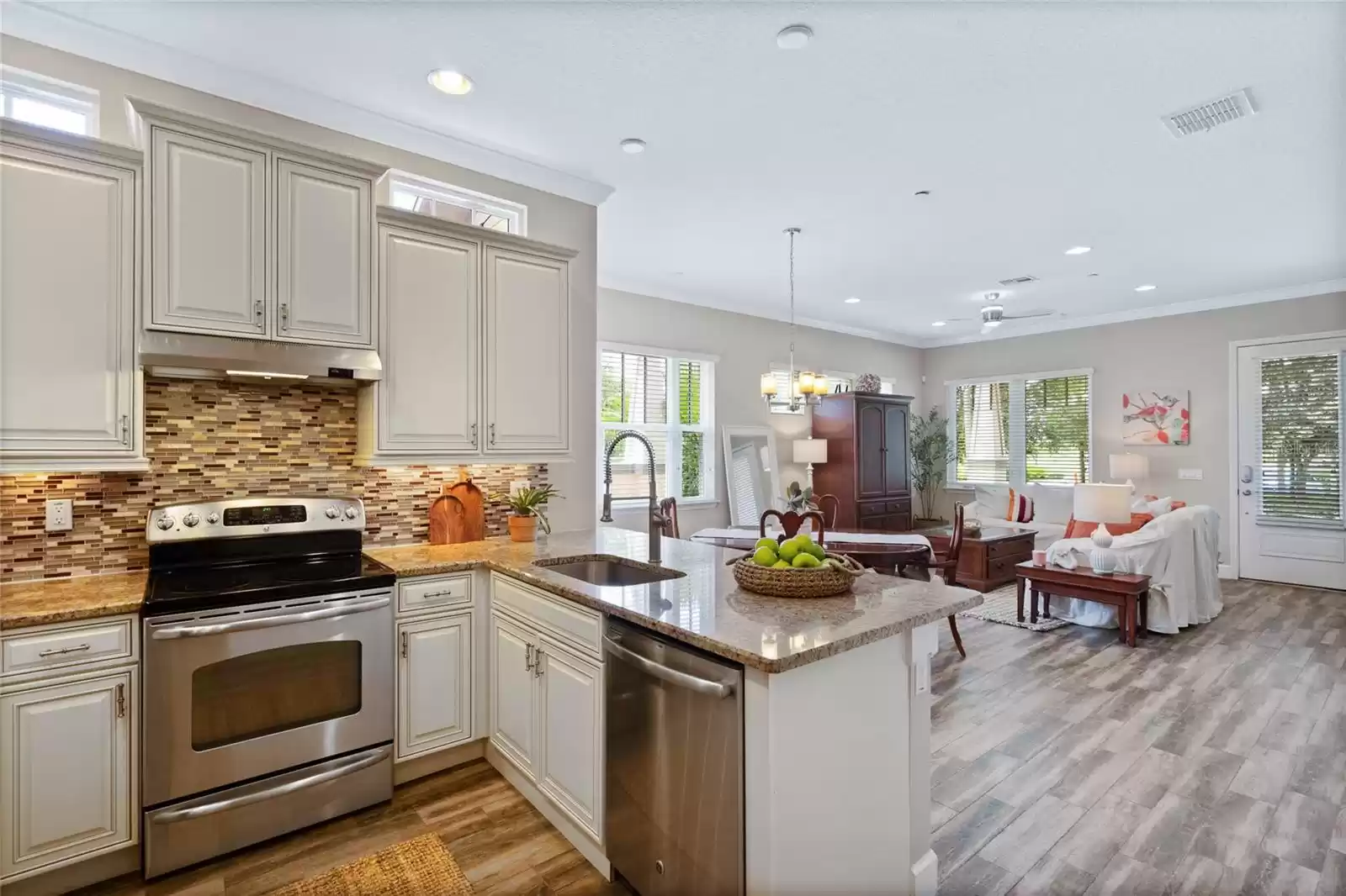 Kitchen with backsplash and 42