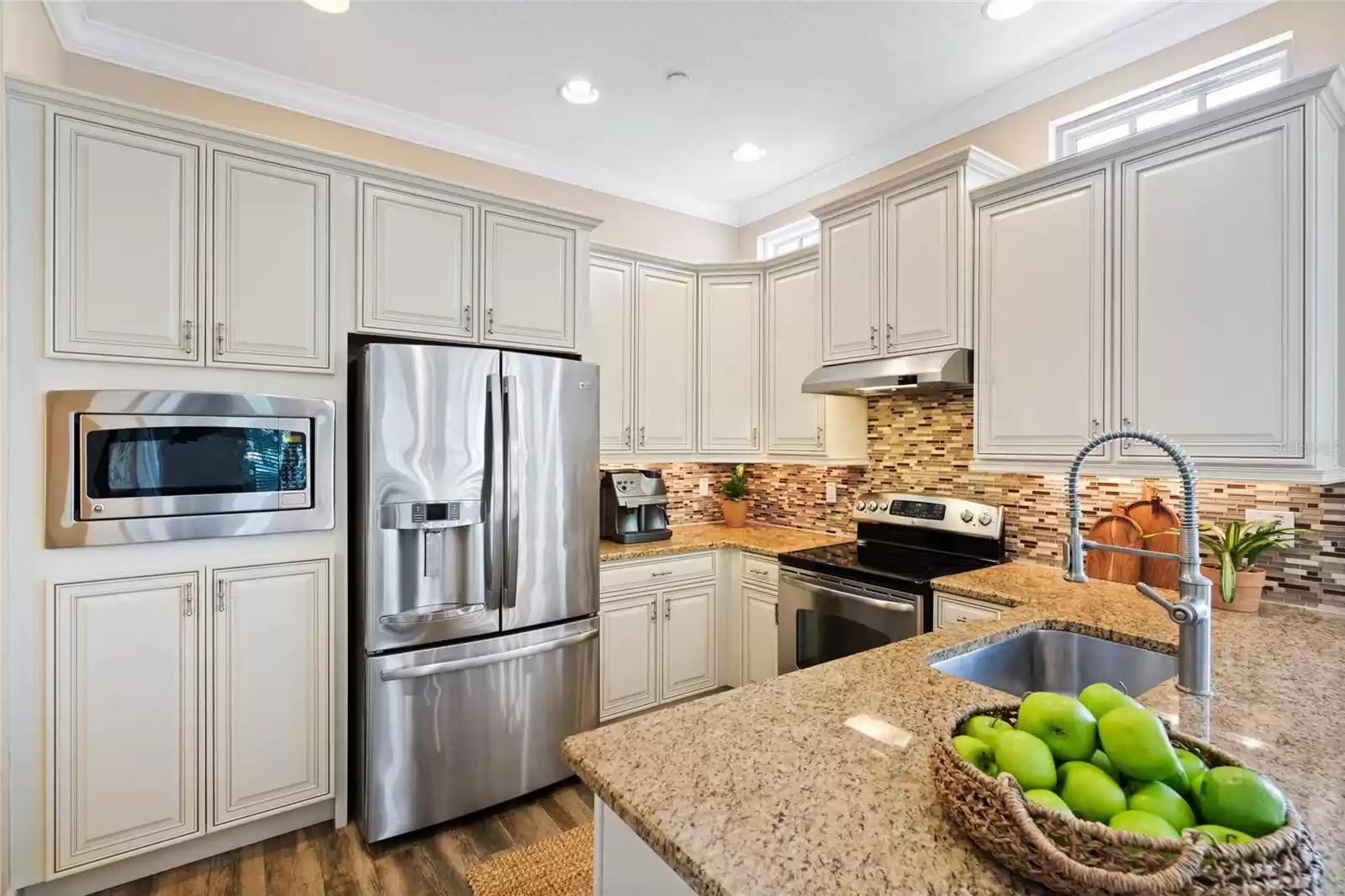 Kitchen with Stainless Steel Appliances and Plenty of Storage Cabinets