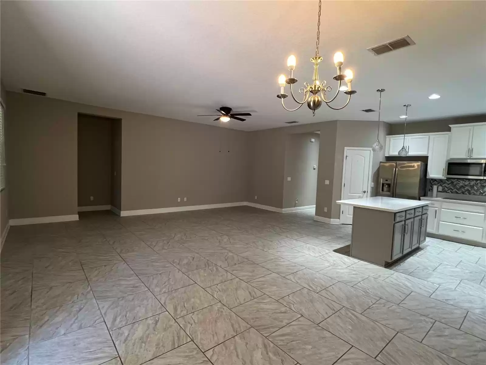 14419 MAGNOLIA RIDGE LOOP, WINTER GARDEN, Florida 34787, 5 Bedrooms Bedrooms, ,3 BathroomsBathrooms,Residential,For Sale,MAGNOLIA RIDGE,MFRS5114394