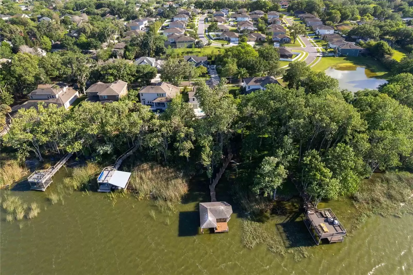 557 LAKE COVE POINTE CIR, WINTER GARDEN, Florida 34787, 5 Bedrooms Bedrooms, ,4 BathroomsBathrooms,Residential,For Sale,LAKE COVE POINTE CIR,MFRO6252812