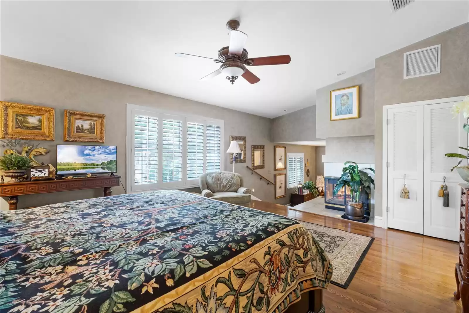 Owner's suite with wood burning fireplace sits above the spacious sitting bonus area