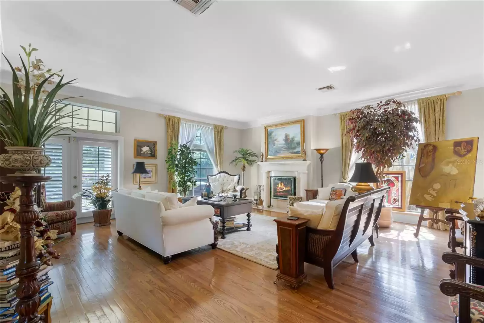 Spacious and separate living room with french doors out to the back patio