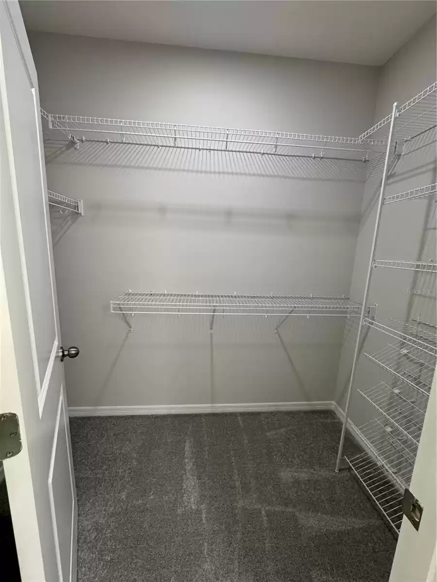 Walk in Closet with builtin shoe rack