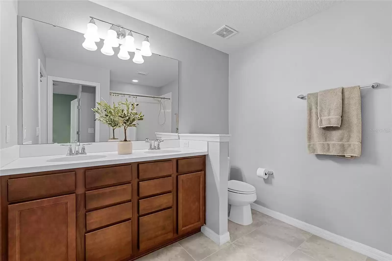 2nd full bathroom inside of 2nd bedroom