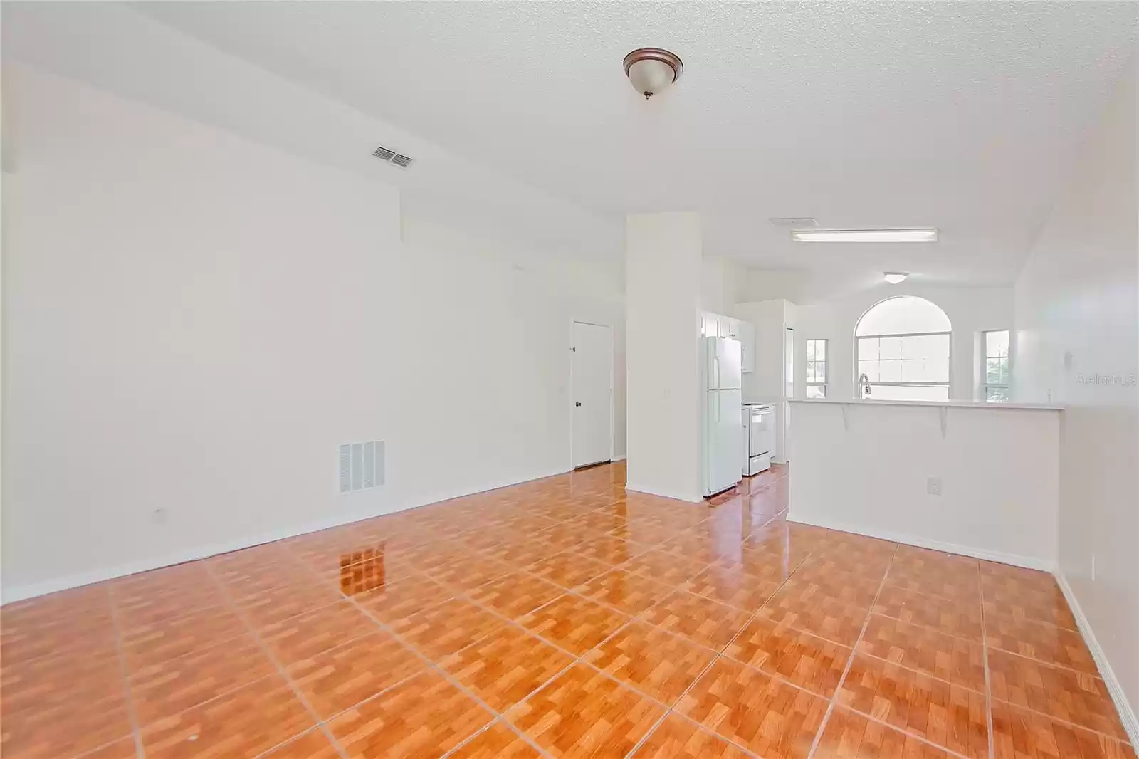 Living Room w/view of Kitchen