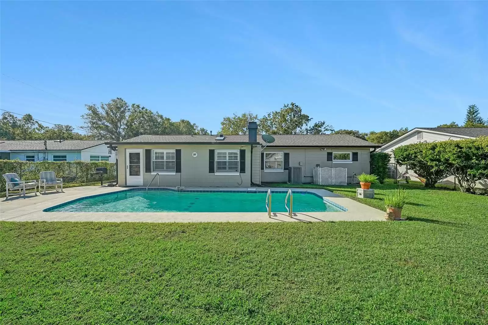 Open air pool in the backyard of this great home!